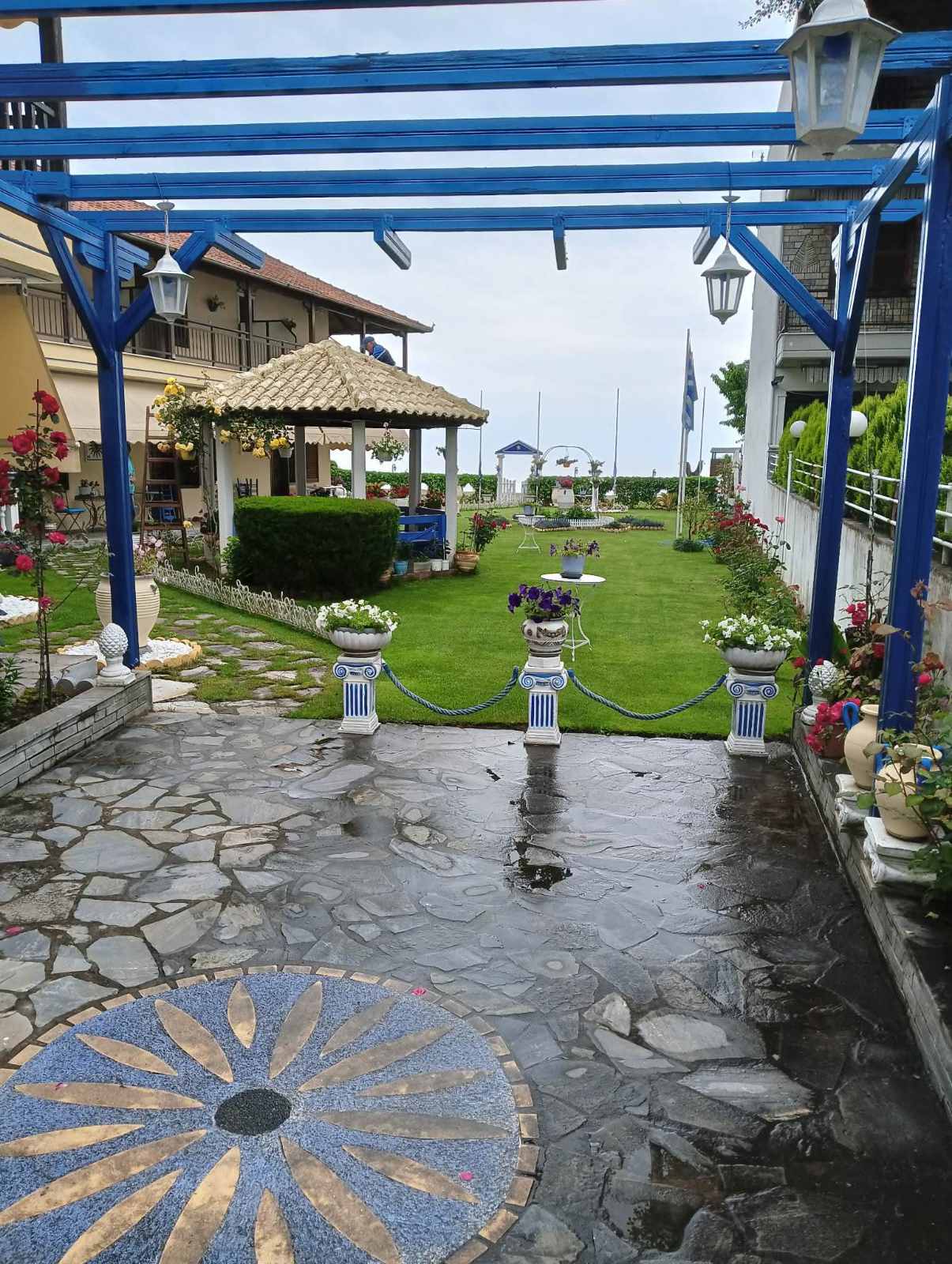 Theos Resort Garden 1
