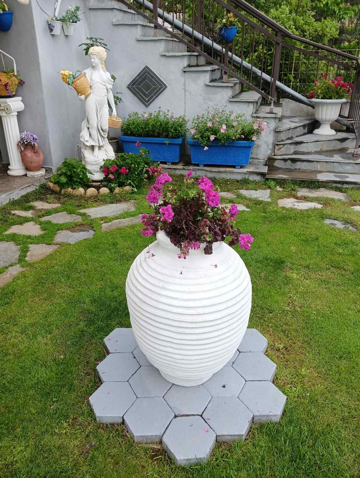Theos Resort Garden 5